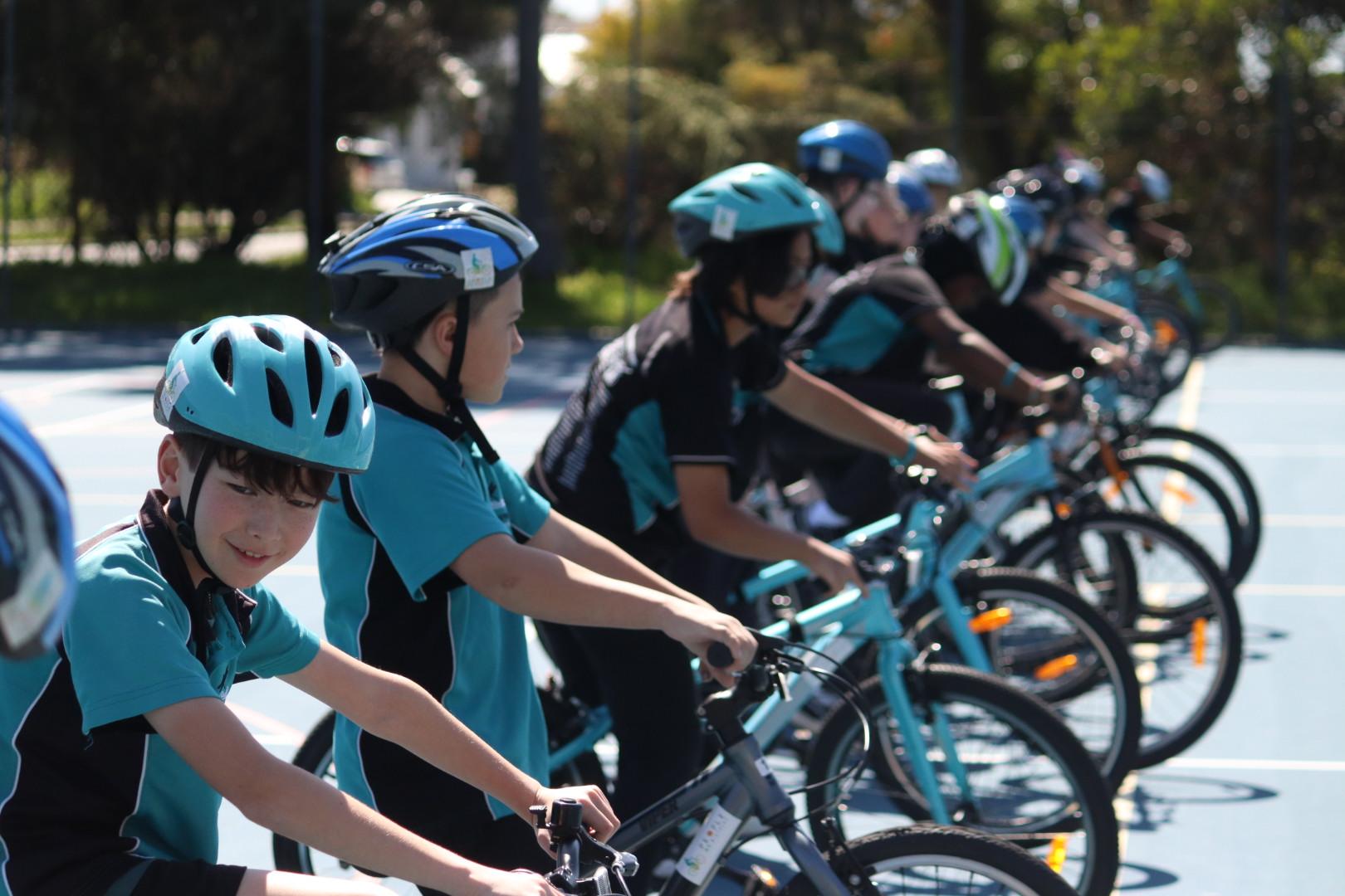 Students riding bikes